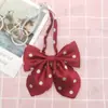 Pajarita original de Song Xiaoxia con orejas de conejo y lunares para niña, estilo universitario japonés con lunares rojos grandes y flores