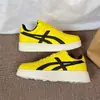 Zapatos de Skate Retro Amarillos de Nicho de Moda para Hombres y Mujeres, Versátiles de Estilo Ins para Parejas, Zapatillas Casuales de Caña Baja para Entrenamiento Alemán, Nuevo Modelo 2025