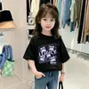 Camiseta de Algodão Puro de Manga Curta para Meninas Verão 2026 Novo Estilo Estampa de Desenho Animado Moda Infantil Versátil Camiseta de Meia Manga