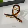 Grampo de Tubarão Geométrico Oval de Liga de Metal Estilo Coreano Verão 2025 Grampo de Cabelo Feminino Acessório de Cabelo Fresco Doce