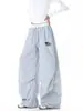 Pantalones casuales bordados de estilo retro para mujeres y hombres, cintura con bloques de color otoñales, pantalones de pierna ancha plisados y curvos