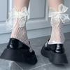 Calcetines huecos Lolita al por mayor transfronterizos calcetines de red con lazo de media pantorrilla finos jk finos para mujer AliExpress