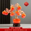 Piezas decorativas temáticas de caqui para 2026, creando una atmósfera festiva para una inauguración de casa, con flores artificiales creativas para exhibir en el mueble de TV de la sala de estar