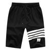 Shorts Casuais Esportivos de Tricô com Quatro Listras para Homens no Verão para Uso ao Ar Livre, Atacado, Versátil, Levemente Elástico, Adequado para Casa e Pijama