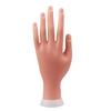 El molde de mano para práctica de arte de uñas permite insertar uñas postizas para principiantes que aprenden a usar pegamento para esmalte de uñas, simulando un modelo de mano postiza.