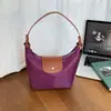 Bolso nuevo con forma de dumpling: ligero, versátil y elegante para ir al trabajo. Un bolso moderno y minimalista, perfecto como bolso de hombro o para llevar bajo el brazo. Tamaño pequeño
