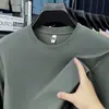 Camiseta casual y elegante de manga larga para hombre, nueva colección 2026, cuello redondo, color liso, amigable con la piel, capa base de otoño, top holgado para hombre