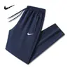 Pantalones Deportivos Casuales Nuevos de Primavera y Otoño para Hombre, Joggers Rectos Holgados, Marca de Moda, Talla Grande, Pantalones de Chándal de Algodón Puro Grises para Hombre