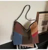 Bolsa de Nicho Grande Capacidade Color Block para Mulheres 2025 Nova Casual para o Dia a Dia Ombro Transversal Bolsa Tote Versátil Tendência