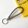 Llavero creativo llavero de cuerda de cuero cordón para llaves colgante de joyería cordón tejido fábrica de cuerda de cuero venta al por mayor