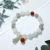 Pulseira de Cabana Verde Tianshan Natural Fabricante Atacado Cabana Verde Tianshan Jade Seda Dourada 8 Pulseira de Cabana Vermelha Fornecimento ao Vivo