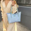Bolsa de Mão para Mulheres 2025 Outono Nova Versátil para o Dia a Dia Ombro Sob o Braço Grande Capacidade Bolsa Tote Casual