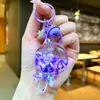 Chaveiro Pirulito Areia Movediça Luminoso Infundido com Óleo Pingente Fofo para Mochila Chaveiro Presente de Parque de Diversões Brinquedo Infantil
