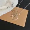 Collar de plata hueco con forma de flor estilo coreano para mujer, adecuado para el verano, cadena larga para la clavícula para combinar con vestidos, añade un toque de elegancia a tu atuendo