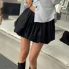 Saia curta de tulipa de alta costura feminina Dongdaemun coreana, saia plissada de lanterna com cintura alta, afunilada, em linha A