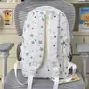 Mochila linda de niña con estrellas estampadas por todas partes, adecuada para estudiantes de secundaria y preparatoria, elegante y ligera
