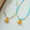 Collar Rotatorio Original de Moda Retro con Perlas de Calabaza y Cuentas Lujo Accesible Gama Alta Exquisito Versátil Turquesa Clavícula