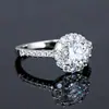 Anillo de Moissanita Nuevo Transfronterizo Europeo y Americano 925 Plata de Ley Flor Redonda Estilo Lujo Ligero Anillo de Compromiso de Boda Joyería