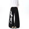 Jeans retro americanos de corte curvo deconstruido, estilo otoño e invierno, diseño de alta costura, corte holgado, adelgazante, pantalones de pierna ancha con caída.