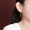 Pendientes de plata de ley S925 con diseño de ciervo, estilo retro nacional, con borlas y superficie de huevo, elegantes y combinables.