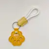 Novo pingente memorial criativo para guardar pelos de pet, porta-cartão de acesso à porta anti-perda, pingente de chaveiro de pata de cachorro