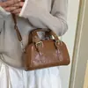 Bolso de Mano Exquisito Pequeño de Salida Retro de Gama Alta para Mujer 2026 Nuevo Verano Bolso de Hombro Único Cruzado para el Trabajo
