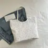 Bolsa Feminina Flor Delicada e Doce 2025 Nova Bolsa de Ombro com Cordão Bolsa de Axila Floral de Alto Valor com Laço