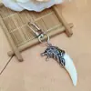 Nova chaveiro criativo europeu e americano transfronteiriço com pingente de óleo, chaveiro de dente de lobo, pingente de bolsa, presente criativo de Halloween