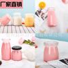 Venta al por mayor, botella de pudín pequeña de 50 ml, botella de leche de vidrio con tapa, botella de nido de yogur, botella de vidrio transparente redonda creativa