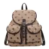 Mochila de lunares estilo Ins para mujer 2026 nueva gran capacidad versátil ligera estudiante mochila escolar mochila simple moderna