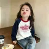 Camiseta infantil de manga longa com mangas raglan, nova coleção primavera e outono, top da moda para o início do outono para crianças, peça externa de algodão puro, camada base