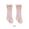 Nuevos calcetines altos para primavera/verano 2026 para bebés niñas, calcetines largos de princesa de malla fina hueca con lazo para niñas