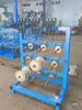 Estante para desenrollar alambre trenzado estante de tensión vertical para alambre eléctrico alambre eléctrico pistola de tensión automática pasiva de múltiples cabezales para manojo de alambre trenzado