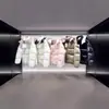 Versión Correcta m Home 23Ss Chaqueta de Plumas Corta de Tela de Nylon Barnizado para Hombres y Mujeres con Capucha Desmontable