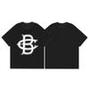 Camiseta de Manga Corta Holgada de Cuello Redondo con Estampado de Lema de Paja de Marca Nicho Americana Cole Buxton para Hombre y Mujer