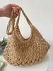 Bolso tejido para mujer para pedidos extranjeros, nuevo bolso de hombro calado de verano 2026, bolso cruzado de gran capacidad para vacaciones en la playa
