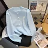 Nuevo cárdigan de punto de manga larga azul claro para primavera, estilo suave y lechoso, suéter corto simple y versátil para mujer