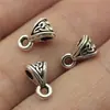 9x 5x 5mm 0.5g multicolor europeo y americano más vendido retro accesorios de joyería conector cabeza colgante