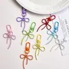 Chaveiro Criativo de Laço Oco de Liga com Etiqueta de Coração Colorida Pingente DIY Charme de Bolsa de Coração Feminino