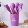 Juego de utensilios de cocina de silicona de grado alimenticio de 12 piezas resistente a altas temperaturas con mango de madera y cilindro de almacenamiento ventas directas de fábrica de herramientas de cocina transfronterizas