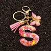 Llavero de moda con letras rosas, lentejuelas de amor, borla de mariposa, llavero, accesorios de colgante de epoxi de cristal para damas