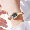 Comercio Exterior Nuevo Moda Popular Temperamento Compacto Ovalado Banda de Acero Pulsera Estilo Reloj de Cuarzo Decorativo para Mujer Listo para la Venta