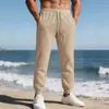 Pantalones casuales jacquard para hombre transfronterizos Amazon europeo y americano primavera y otoño comercio exterior color liso cordón casual sueltos deportivos joggers
