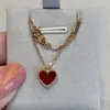 V Jin Fan familia pequeño corazón rojo amor collar femenino 18 oro rosa cadena de clavícula corazón de ágata roja colgante outlet de fábrica