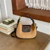 Bolso de mano único de gamuza con forma de media luna, un bolso cruzado ligero y versátil para mujer, un bolso pequeño con forma de dumpling, nuevo estilo 2026