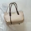 Bolsa de padrão trançado de grande capacidade, nova bolsa de ombro/axila de cor sólida vintage para o verão de 2026, bolsa tote de mão estilo coreano