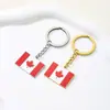 Llavero Decorativo Canadiense Retro de Goteo de Aceite Más Vendido Transfronterizo para Hombres y Mujeres, Estilo Étnico Versátil, Accesorios de Colgante de Acero de Titanio