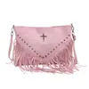 Bolso de hombro europeo y americano de cuero suave con tachuelas, bolso tote casual de moda, bolso con borlas, bolso cruzado texturizado para el día a día para mujer