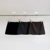 Falda de Lana Gris para Mujer 2025 Otoño e Invierno Nuevo Estilo Negra de Cintura Alta Versátil Corta de Corte A para Figuras Pequeñas