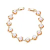Pulsera Elegante Retro de Flor de Pétalo de Perla Incrustada en Cobre Diseño de Nicho Joyería de Mano de Perla Redonda